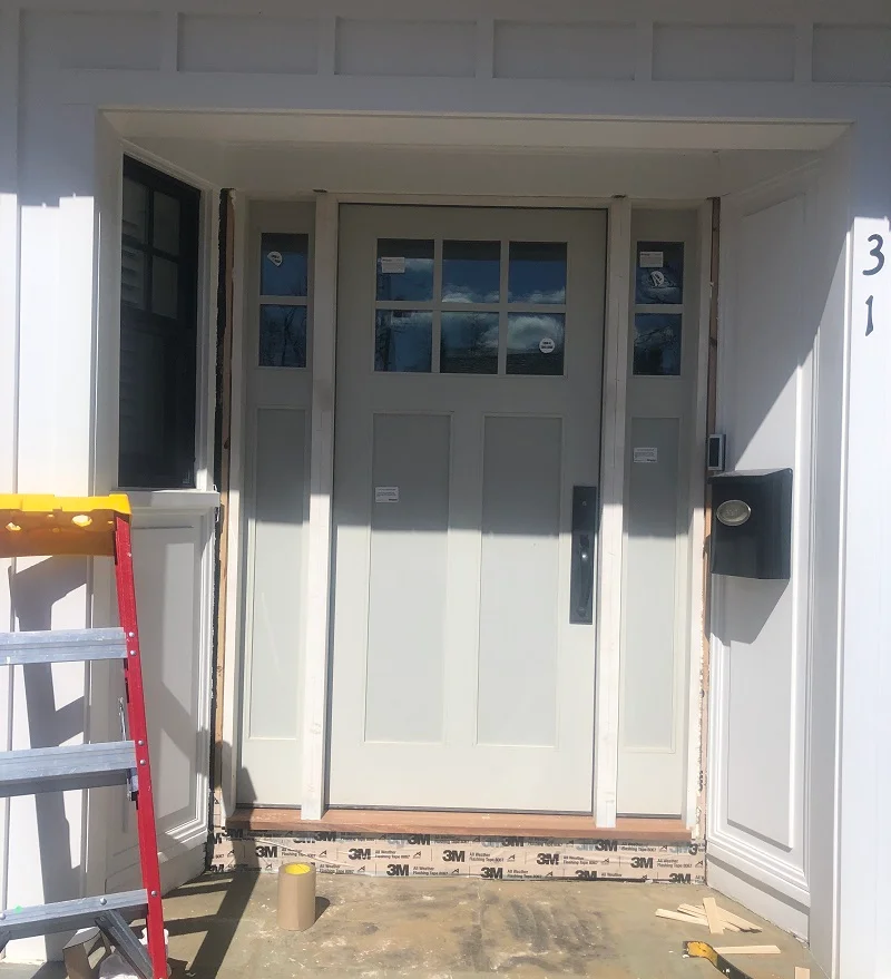 Custom Simpson wood door with sidelights installed in Scarsdale,NY